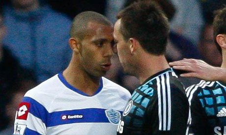 British footballers Anton Ferdinand and John Terry confront each other over hate speech from Terry